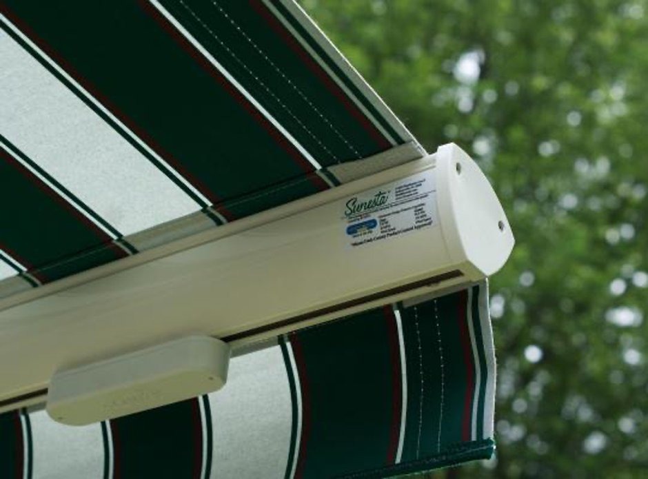 A Sunesta retractable awning wind sensor accessory, attached beneath the arm of the awning.